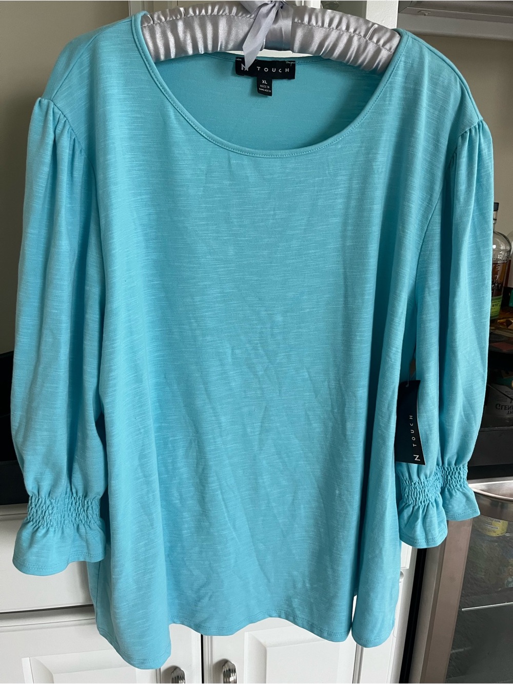 Women's Aqua Long-Sleeve Puff Sleeve Tee with smocked cuffs. Brand new XL